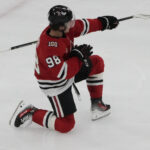 Oct 28, 2025; Chicago, Illinois, USA; Chicago Blackhawks center Connor Bedard (98) celebrates his hat trick against the Ottawa Senators during the third period at United Center. Mandatory Credit: David Banks-Imagn Images