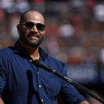 Oct 1, 2023; St. Louis, Missouri, USA; St. Louis Cardinals former player Albert Pujols speaks at a retirement ceremony for starting pitcher Adam Wainwright (not pictured) before a game against the Cincinnati Reds at Busch Stadium.