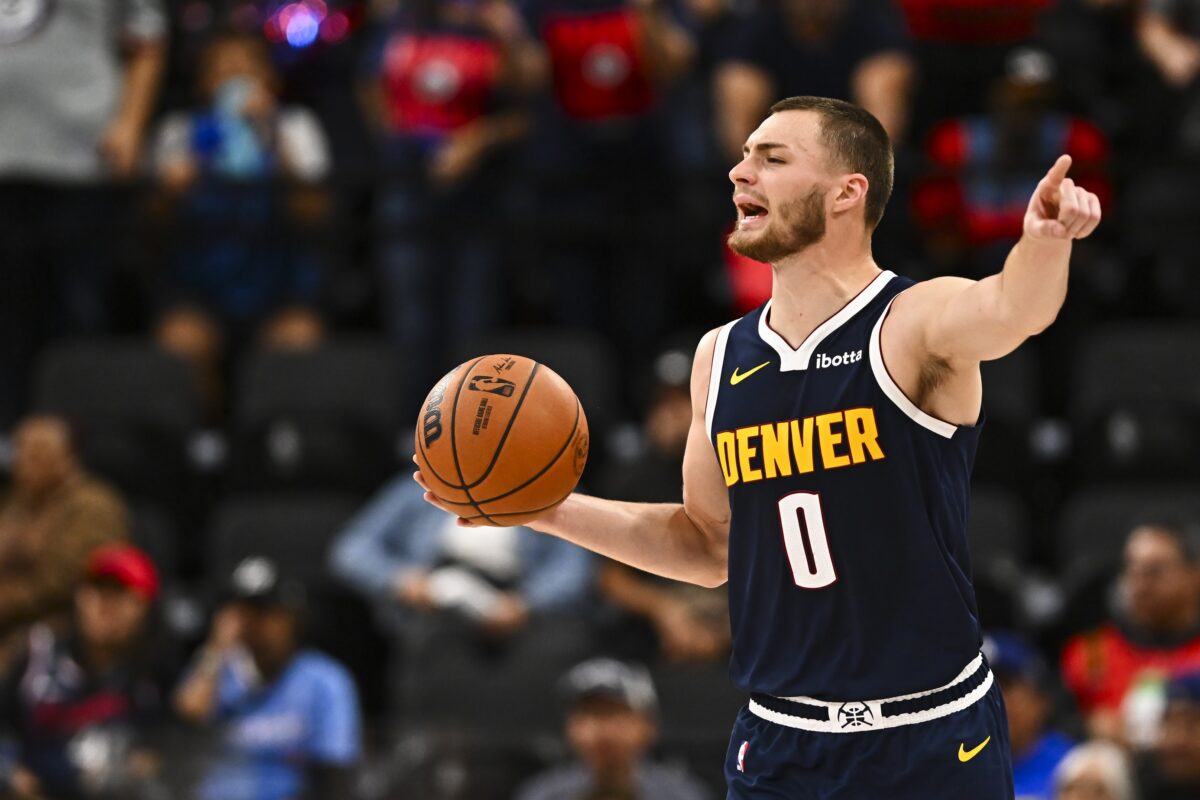 Oct 12, 2025; Inglewood, California, USA; Denver Nuggets forward Christian Braun (0) looks to pass the ball against the Los Angeles Clippers during the third quarter at Intuit Dome.