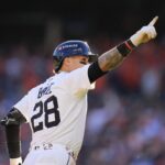 Tigers short stop Javier Baez bats a 2-run home run against Mariners during the sixth inning of Game 4 of ALDS at Comerica Park in Detroit on Wednesday, Oct. 8, 2025.