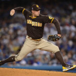 September 11, 2021; Los Angeles, California, USA; San Diego Padres relief pitcher Craig Stammen (34) throws aganst the Los Angeles Dodgers during the fifth inning at Dodger Stadium. Mandatory Credit: Gary A. Vasquez-USA TODAY Sports