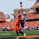 Patriots Bengals New England Patriots cornerback Marcus Jones (25) breaks up a pass in the end zone to Cincinnati Bengals wide receiver Trenton Irwin (16) in the second quarter of the NFL Week 1 game between the Cincinnati Bengals and the New England Patriots at Paycor Stadium in downtown Cincinnati on Sunday, Sept. 8, 2024.