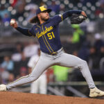 Aug 5, 2025; Atlanta, Georgia, USA; Milwaukee Brewers starting pitcher Freddy Peralta (51) throws against the Atlanta Braves in the third inning at Truist Park. Mandatory Credit: Brett Davis-Imagn Images