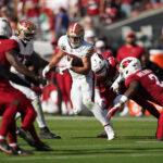 49ers Cardinals Sep 21, 2025; Santa Clara, California, USA; San Francisco 49ers running back Christian McCaffrey (23) carries the ball against the Arizona Cardinals during the second half at Levi's Stadium. Mandatory Credit: Cary Edmondson-Imagn Images