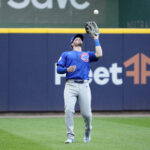 Gold Glove 2025 Oct 4, 2025; Milwaukee, Wisconsin, USA; Chicago Cubs left fielder Ian Happ (8) makes a catch for an out against the Milwaukee Brewers during the sixth inning of game one of the NLDS round for the 2025 MLB playoffs at American Family Field. Mandatory Credit: Michael McLoone-Imagn Images