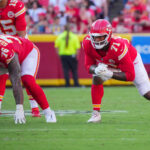 Sep 28, 2025; Kansas City, Missouri, USA; Kansas City Chiefs offensive tackle Kingsley Suamataia (76) and offensive tackle Josh Simmons (71) at the line of scrimmage against the Baltimore Ravens during the game at GEHA Field at Arrowhead Stadium. Mandatory Credit: Denny Medley-Imagn Images