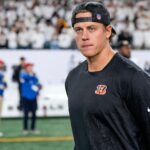 Injured Cincinnati Bengals quarterback Joe Burrow (9) walks on the field after the fourth quarter of the NFL Week 7 game between the Cincinnati Bengals and the Pittsburgh Steelers at Paycor Stadium in downtown Cincinnati on Thursday, Oct. 16, 2025. The Bengals won, 33-31.