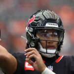 Nov 2, 2025; Houston, Texas, USA; Houston Texans quarterback C.J. Stroud (7) warms up before a game against the Denver Broncos at NRG Stadium. Mandatory Credit: Thomas Shea-Imagn Images