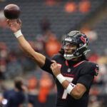 Nov 2, 2025; Houston, Texas, USA; Houston Texans quarterback C.J. Stroud (7) warms up before a game against the Denver Broncos at NRG Stadium. Mandatory Credit: Thomas Shea-Imagn Images