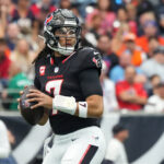 Nov 2, 2025; Houston, Texas, USA; Houston Texans quarterback C.J. Stroud (7) drops to throw during the first half against the Denver Broncos at NRG Stadium. Mandatory Credit: Sean Thomas-Imagn Images