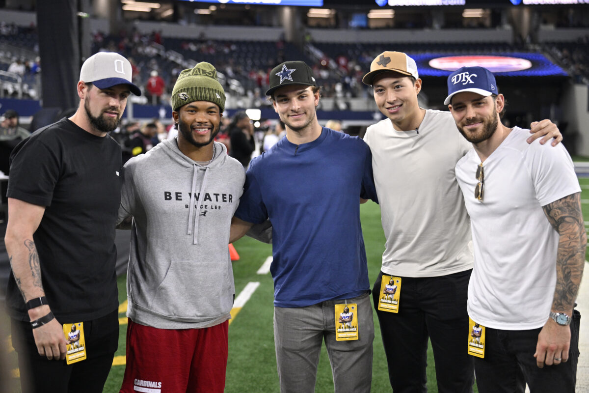 Nov 3, 2025; Arlington, Texas, USA; From left: Dallas Stars player Jamie Benn, Arizona Cardinals quarterback Kyler Murray (1), and Dallas Stars players Wyatt Johnston, Jason Robertson, and Tyler Seguin pose for a photo after the 2027 Stadium Series announcement at AT&T Stadium. Mandatory Credit: Jerome Miron-Imagn Images