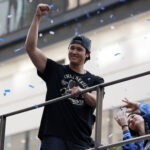 Nov 3, 2025; Los Angeles, CA, USA; Los Angeles Dodgers two-way player Shohei Ohtani acknowledges the crowd during the World Series championship parade at downtown Los Angeles. Mandatory Credit: Kiyoshi Mio-Imagn Images