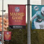Commanders Dolphins Nov 12, 2025; Madrid, Spain; Street banners with images of Miami Dolphins linebacker Chop Robinson (44) and Washington Commanders safety Will Harris (3) at Santiago Bernabeu Stadium, the site of the 2025 NFL Madrid Game. Mandatory Credit: Kirby Lee-Imagn Images