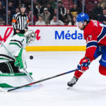 Nov 13, 2025; Montreal, Quebec, CAN; Dallas Stars goalie Casey DeSmith (1) makes a save against Montreal Canadiens right wing Josh Anderson (17) during the second period at Bell Centre. Mandatory Credit: David Kirouac-Imagn Images