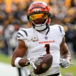 Cincinnati Bengals wide receiver Ja'Marr Chase (1) runs warmups before the first quarter of the NFL Week 11 game between the Pittsburgh Steelers and the Cincinnati Bengals at Acrisure Stadium in Pittsburgh on Sunday, Nov. 16, 2025.