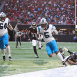 Nov 16, 2025; Atlanta, Georgia, USA; Carolina Panthers running back Rico Dowdle (5) makes a catch that is determined as out of bounds in the fourth quarter against the Atlanta Falcons at Mercedes-Benz Stadium. Mandatory Credit: Brett Davis-Imagn Images