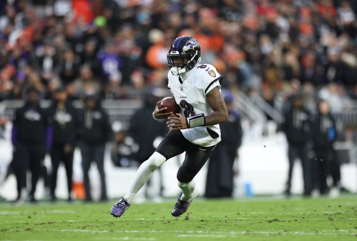 Nov 16, 2025; Cleveland, Ohio, USA; Baltimore Ravens quarterback Lamar Jackson (8) runs for a gain during the first quarter against the Cleveland Browns at Huntington Bank Field. Mandatory Credit: Scott Galvin-Imagn Images