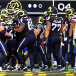 Nov 16, 2025; Inglewood, California, USA; The Los Angeles Rams celebrate a touchdown by tight end Colby Parkinson (84) during the second half against the Seattle Seahawks at SoFi Stadium. Mandatory Credit: Gary A. Vasquez-Imagn Images