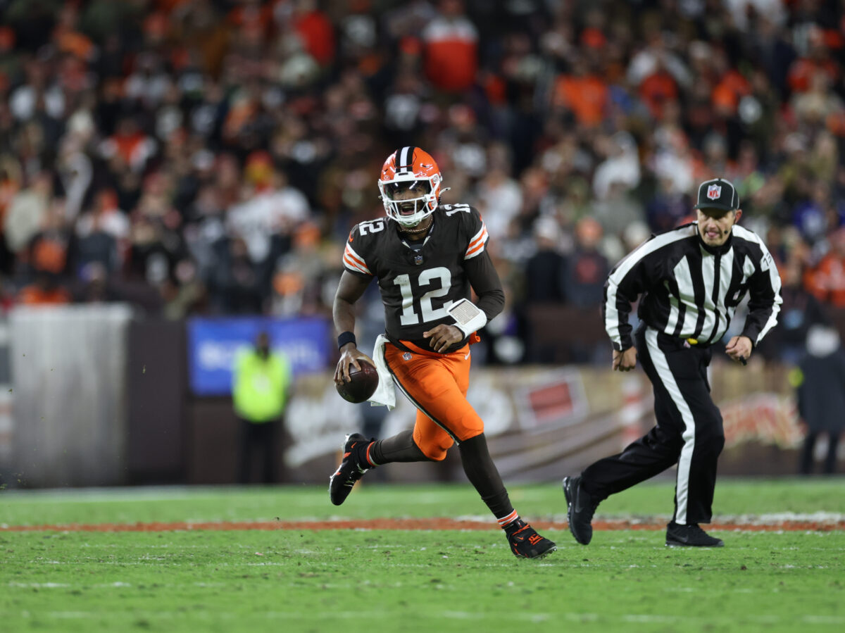 Nov 16, 2025; Cleveland, Ohio, USA; Cleveland Browns quarterback Shedeur Sanders (12) runs for a gain during the fourth quarter against the Baltimore Ravens at Huntington Bank Field. Mandatory Credit: Scott Galvin-Imagn Images