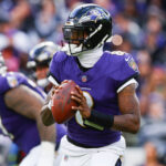 Nov 23, 2025; Baltimore, Maryland, USA; Baltimore Ravens quarterback Lamar Jackson (8) looks to pass during the second quarter against the New York Jets at M&T Bank Stadium. Mandatory Credit: Peter Casey-Imagn Images