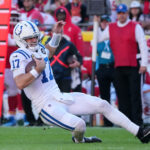 Nov 23, 2025; Kansas City, Missouri, USA; Indianapolis Colts quarterback Daniel Jones (17) runs against the Kansas City Chiefs in the second half at GEHA Field at Arrowhead Stadium. Mandatory Credit: Denny Medley-Imagn Images