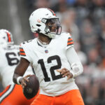 Nov 23, 2025; Paradise, Nevada, USA; Cleveland Browns quarterback Shedeur Sanders (12) passes against the Las Vegas Raiders in the first half at Allegiant Stadium. Mandatory Credit: Kirby Lee-Imagn Images