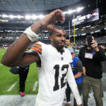 Nov 23, 2025; Paradise, Nevada, USA; Cleveland Browns quarterback Shedeur Sanders (12) reacts at the end of the game against the Las Vegas Raiders at Allegiant Stadium. Mandatory Credit: Kirby Lee-Imagn Images