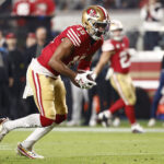 Nov 24, 2025; Santa Clara, California, USA; San Francisco 49ers wide receiver Jauan Jennings (15) makes a catch against the Carolina Panthers during the first half at Levi's Stadium. Mandatory Credit: Kelley L Cox-Imagn Images