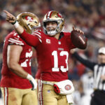 Nov 24, 2025; Santa Clara, California, USA; San Francisco 49ers quarterback Brock Purdy (13) reacts against the Carolina Panthers during the first half at Levi's Stadium. Mandatory Credit: Kelley L Cox-Imagn Images