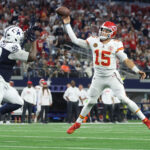 Nov 27, 2025; Arlington, Texas, USA; Kansas City Chiefs quarterback Patrick Mahomes (15) throws a pass for a touchdown against Dallas Cowboys defensive tackle Quinnen Williams (92) during the fourth quarter at AT&T Stadium. Mandatory Credit: Kevin Jairaj-Imagn Images
