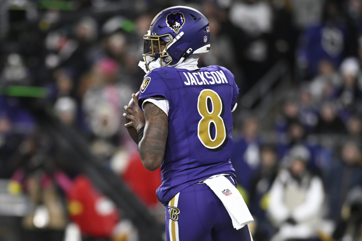 Nov 27, 2025; Baltimore, Maryland, USA; Baltimore Ravens quarterback Lamar Jackson (8) drops back to pass against the Cincinnati Bengals during the first half at M&T Bank Stadium. Mandatory Credit: Tommy Gilligan-Imagn Images