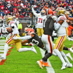 Nov 30, 2025; Cleveland, Ohio, USA; San Francisco 49ers quarterback Brock Purdy (13) scores a touchdown during the second half against the Cleveland Browns at Huntington Bank Field. Mandatory Credit: Ken Blaze-Imagn Images