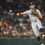 Sep 27, 2025; Anaheim, California, USA; Houston Astros shortstop Mauricio Dubón (14) throws to first base to force an out against the Los Angeles Angels during the fifth inning at Angel Stadium.