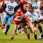 Nov 6, 2022; Kansas City, Missouri, USA; Kansas City Chiefs tight end Travis Kelce (87) dives for extra yards after a catch in over time at GEHA Field at Arrowhead Stadium. Mandatory Credit: George Walker IV / Tennessean.com