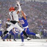 Bengals Bills Cincinnati Bengals wide receiver Ja'Marr Chase (1) leaps fo a catch in the zone as Buffalo Bills linebacker Matt Milano (58) defends in the second quarter during an NFL divisional playoff football game between the Cincinnati Bengals and the Buffalo Bills, Sunday, Jan. 22, 2023, at Highmark Stadium in Orchard Park, N.Y. The catch was ruled incomplete upon further review.