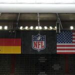 Nov 10, 2024; Munich, Germany; German, NFL shield and United States flags during the 2024 NFL Munich Game at Allianz Arena. Mandatory Credit: Kirby Lee-Imagn Images Munique