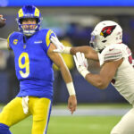 Rams Cardinals Dec 28, 2024; Inglewood, California, USA; Los Angeles Rams quarterback Matthew Stafford (9) throws an incomplete pass as he is pressured by Arizona Cardinals cornerback Sean Murphy-Bunting (23) in the first half at SoFi Stadium. Mandatory Credit: Jayne Kamin-Oncea-Imagn Images