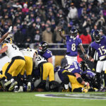 Steelers Ravens Jan 11, 2025; Baltimore, Maryland, USA; Baltimore Ravens quarterback Lamar Jackson (8) reacts in the fourth quarter against the Pittsburgh Steelers in an AFC wild card game at M&T Bank Stadium. Mandatory Credit: Tommy Gilligan-Imagn Images