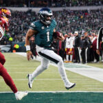 Eagles Commanders Jan 26, 2025; Philadelphia, PA, USA; Philadelphia Eagles quarterback Jalen Hurts (1) runs with the ball for a touchdown against the Washington Commanders during the second half in the NFC Championship game at Lincoln Financial Field. Mandatory Credit: Eric Hartline-Imagn Images