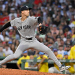 Sep 13, 2025; Boston, Massachusetts, USA; New York Yankees relief pitcher Luke Weaver (30) pitches against the Boston Red Sox during sixth inning at Fenway Park. Mandatory Credit: Eric Canha-Imagn Images