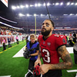 Sep 15, 2025; Houston, Texas, USA; Tampa Bay Buccaneers wide receiver Mike Evans (13) looks on after the game against the Houston Texans at NRG Stadium. Mandatory Credit: Thomas Shea-Imagn Images