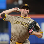 Sep 16, 2025; New York City, New York, USA; San Diego Padres starting pitcher Michael King (34) delivers a pitch during the third inning against the New York Mets at Citi Field. Mandatory Credit: Vincent Carchietta-Imagn Images