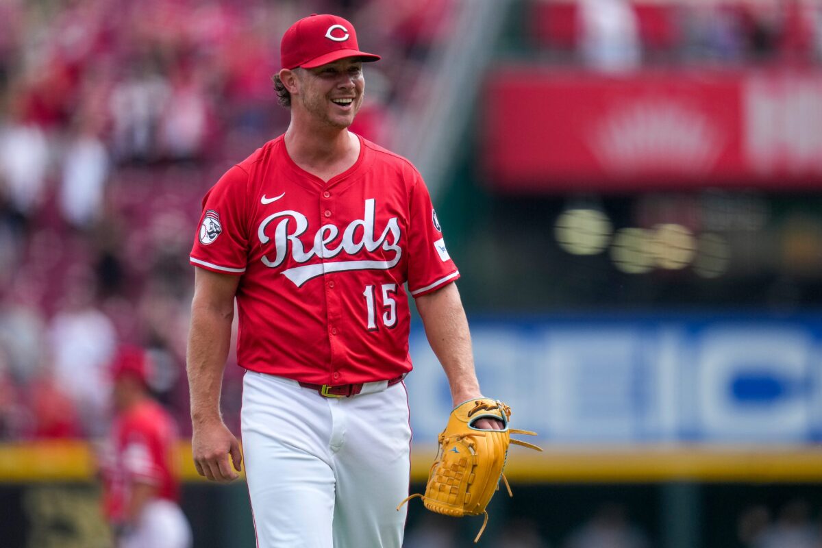 Cincinnati Reds relief pitcher Emilio Pagan (15) smiles after the final out of the ninth inning of the MLB National League game between the Cincinnati Reds and the Pittsburgh Pirates at Great American Ball Park in downtown Cincinnati on Thursday, Sept. 25, 2025. The Reds won, 2-1.