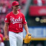 Cincinnati Reds relief pitcher Emilio Pagan (15) smiles after the final out of the ninth inning of the MLB National League game between the Cincinnati Reds and the Pittsburgh Pirates at Great American Ball Park in downtown Cincinnati on Thursday, Sept. 25, 2025. The Reds won, 2-1.