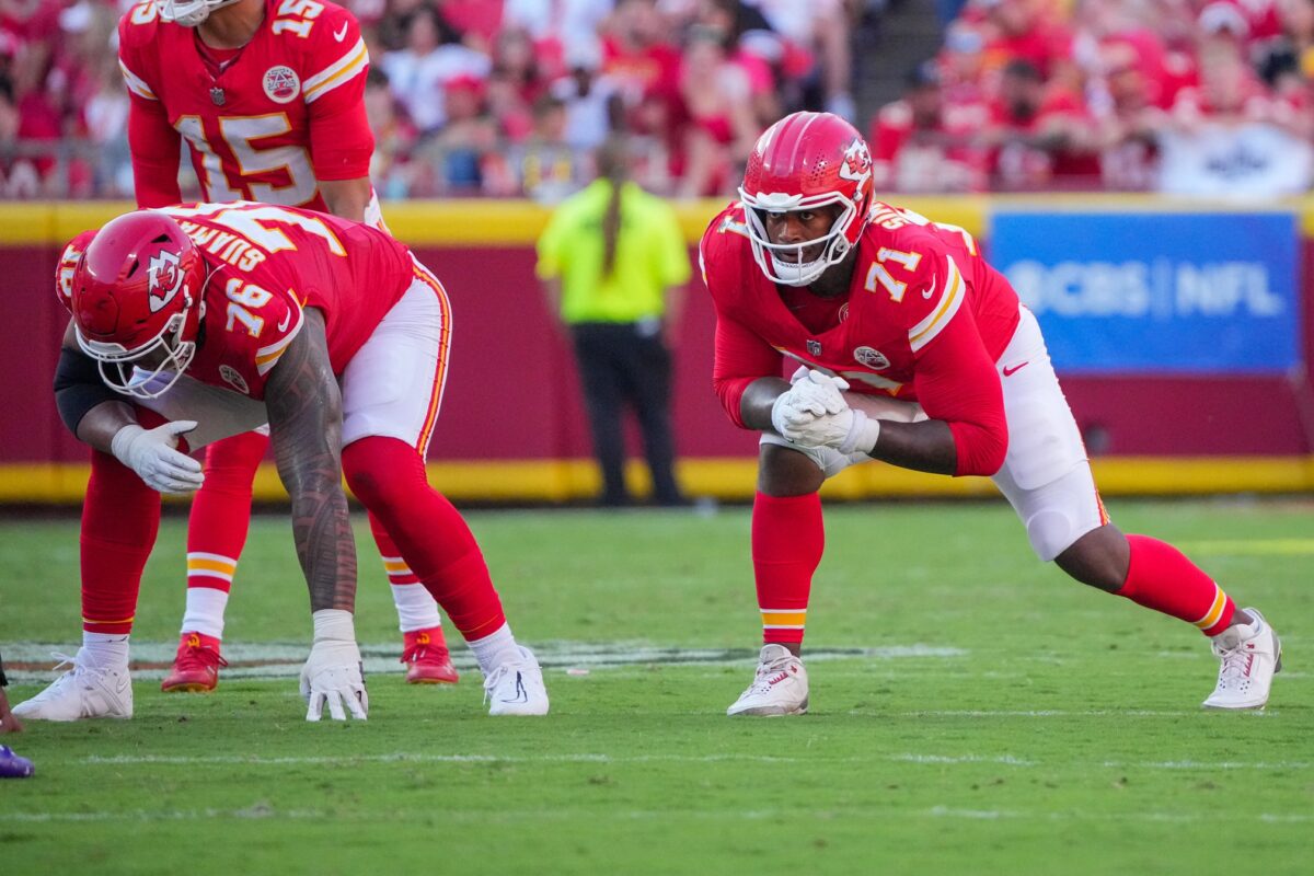 Sep 28, 2025; Kansas City, Missouri, USA; Kansas City Chiefs offensive tackle Kingsley Suamataia (76) and offensive tackle Josh Simmons (71) at the line of scrimmage against the Baltimore Ravens during the game at GEHA Field at Arrowhead Stadium. Mandatory Credit: Denny Medley-Imagn Images