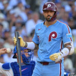 Oct 9, 2025; Los Angeles, California, USA; Philadelphia Phillies right fielder Nick Castellanos (8) reacts after striking out in the fifth inning against the Los Angeles Dodgers during game four of the NLDS round for the 2025 MLB playoffs at Dodger Stadium. Mandatory Credit: Jayne Kamin-Oncea-Imagn Images