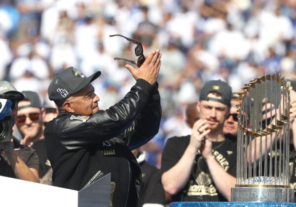 Dodgers manager Dave Roberts acknowledges the crowd during the 2025 World Series championship celebration at Dodger Stadium in Los Angeles on Monday, Nov. 3, 2025.