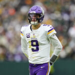 Nov 23, 2025; Green Bay, Wisconsin, USA; Minnesota Vikings quarterback J.J. McCarthy (9) during the game against the Green Bay Packers at Lambeau Field. Mandatory Credit: Jeff Hanisch-Imagn Images