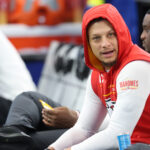 Nov 27, 2025; Arlington, Texas, USA; Kansas City Chiefs quarterback Patrick Mahomes (15) sits on the bench prior to the game against the Dallas Cowboys at AT&T Stadium. Mandatory Credit: Kevin Jairaj-Imagn Images
