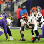 Nov 27, 2025; Baltimore, Maryland, USA; Cincinnati Bengals quarterback Joe Burrow (9) takes a snap against the Baltimore Ravens during the first half at M&T Bank Stadium. Mandatory Credit: Mitch Stringer-Imagn Images